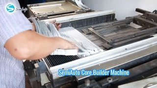 Macchina per la costruzione di nuclei semiautomatica